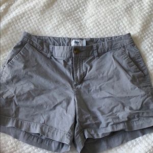 Grey shorts.